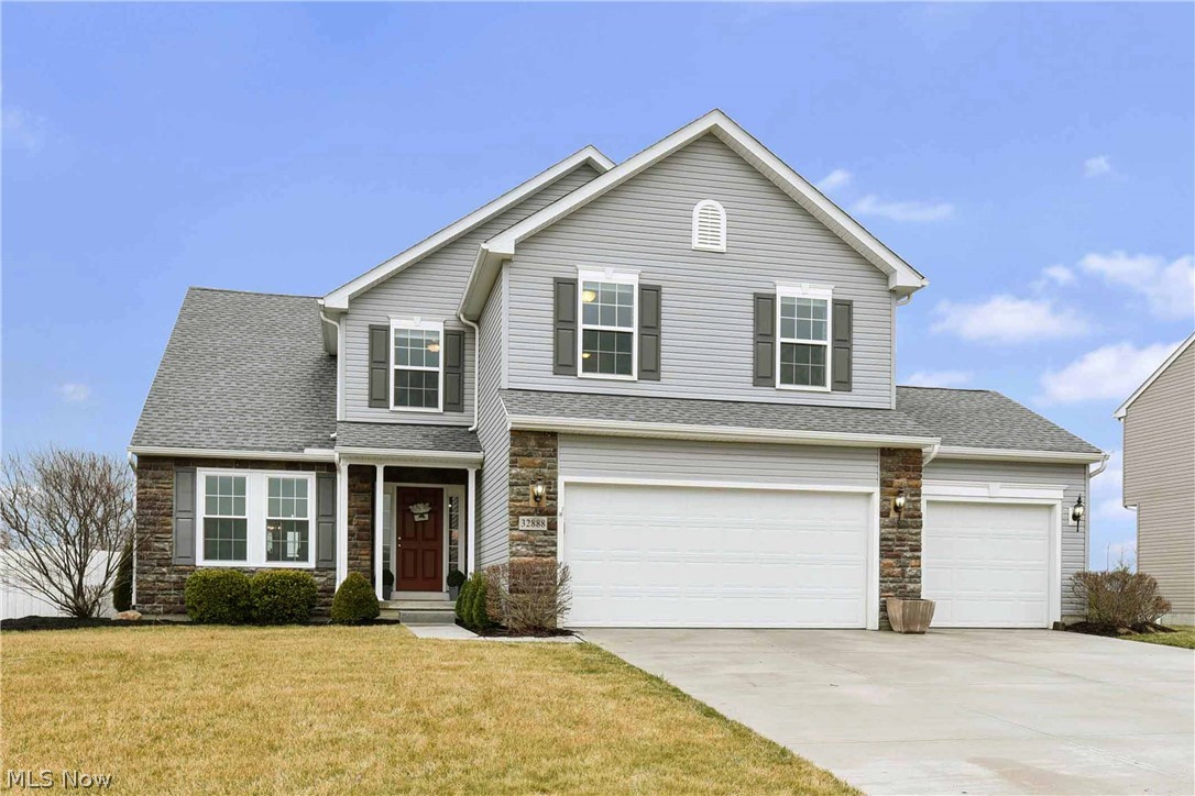 Prepare to be Moved!..Into this North Ridgeville Colonial, in the desirable Cypress Station community. CLICK ON VIRTUAL TOUR LINK! This spacious home has a neutral color palette - move-in and decorate! So many details in this home incl. board and batten trim, vaulted ceilings, recessed lighting, and upgraded finishes. Prof. landscaping and wide driveway with 3 car garage give this home great curb appeal. Step inside and appreciate the hand-scraped hardwood floors that contrast against the bright white trim. An office off the foyer has doors for privacy. This home's open floor plan is perfect for entertaining and everyday family living. Cooking is a delight in this kitchen with s/s appliances, quartz counters, and tile backsplash. Lots of counter space and cabinets mean no shortage of prep and storage space. Windows and french doors flood the space with natural light. Enjoy a fire in the stone fireplace from the great room or adjoining dining area. First-floor master bedroom with a spac