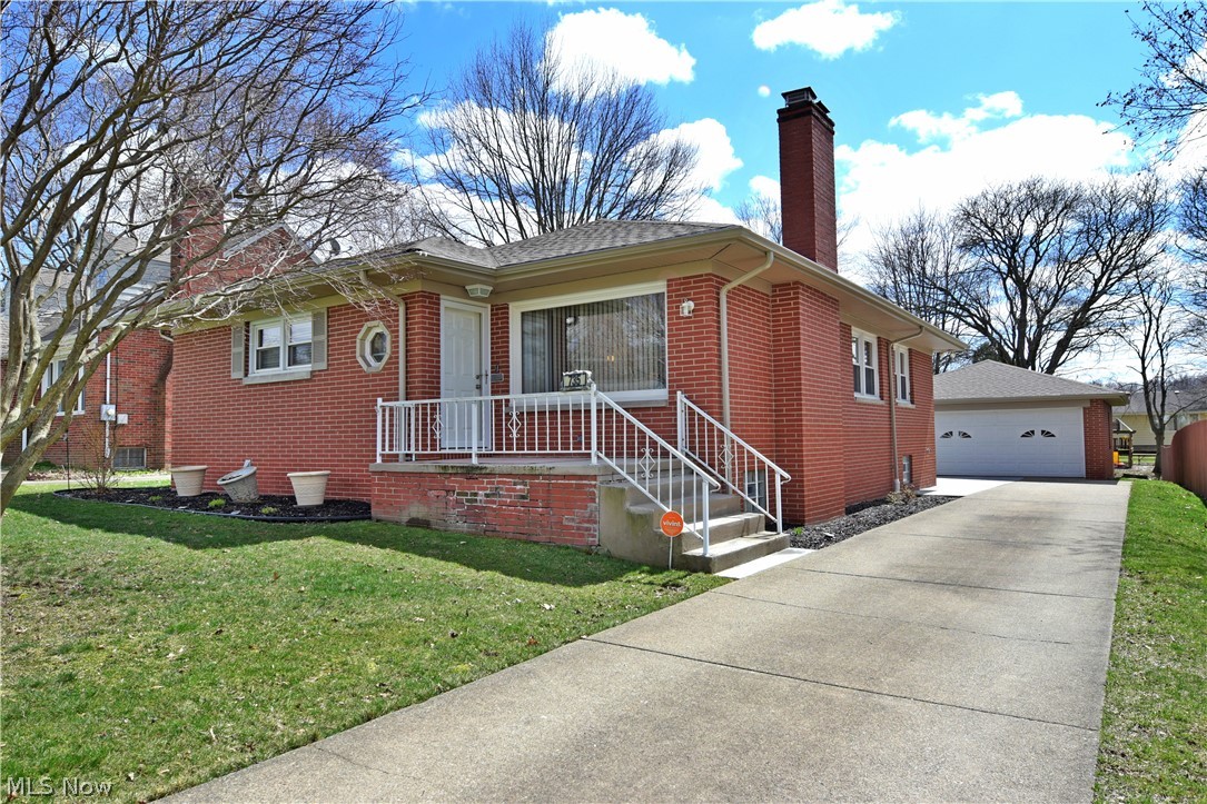 Quality all brick ranch with 3 Bedrooms, 2 full baths, a 2 car garage and a finished basement which makes this home over 2000 sq. ft! Refinished hardwood floors in the living room dining room and hallway. Stone fireplace in the living room and a fresh coat of neutral paint. New flooring in the spacious kitchen and 3 large bedrooms with a full bath and new tub/surround. Downstairs is a fully renovated kitchen and a huge rec room area with a gas fireplace! Finished basement area has a new, upgraded ceiling tile.Full bath in the basement makes this area perfect for entertaining all of your friends and family! Enclosed patio overlooks the private backyard. Other major updates include, new roof,gutters, soffit and facia, glass block windows in basement,new sections of concrete drive, exterior doors, new appliances in downstairs kitchen, custom blinds throughout stay. One year Home Warranty paid by the seller to the lucky new home owner!