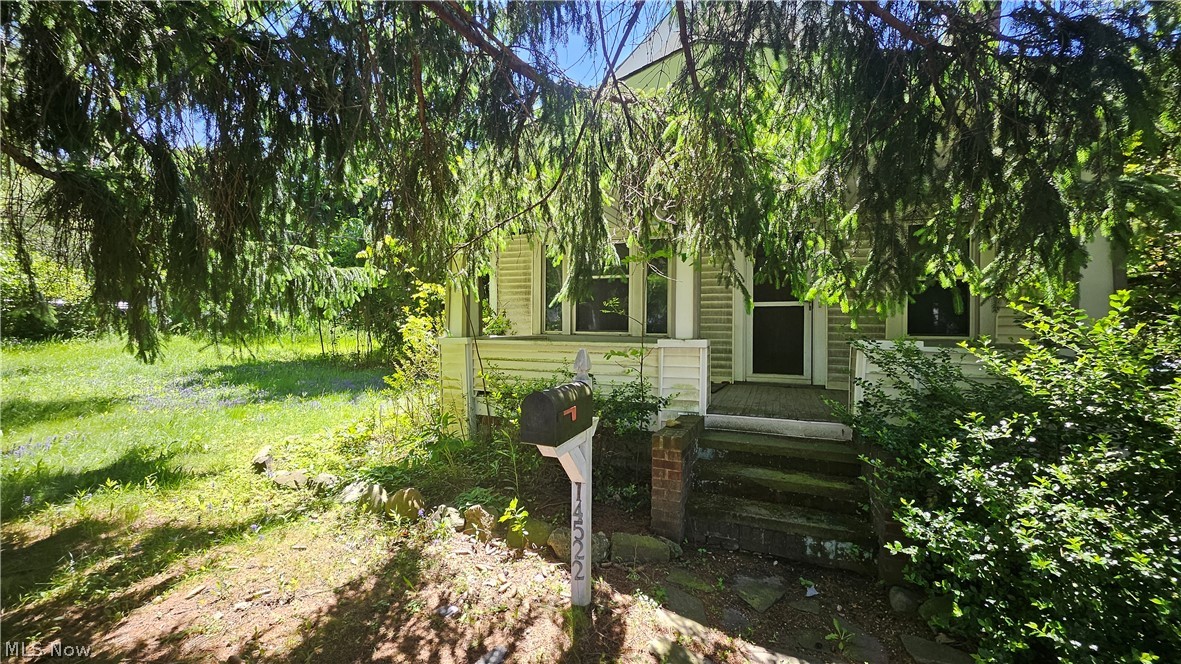 Incredible opportunity on a scenic .69-acre wooded and treed lot in a prime location! Whether you are looking to renovate, invest, or build new, this property offers endless potential. The existing home features a first-floor living room, dining room, kitchen, and full bath, with two bedrooms on the second floor, a full basement, and detached 1.5-car garage. The home is in need of significant updates and repairs and is being sold as-is. All contents remaining in the home at possession will transfer with the sale. Buyer to assume all city POS violations. Cash offers only—no financing or seller financing. Rare chance to secure a beautiful homesite with tremendous upside and possibilities!