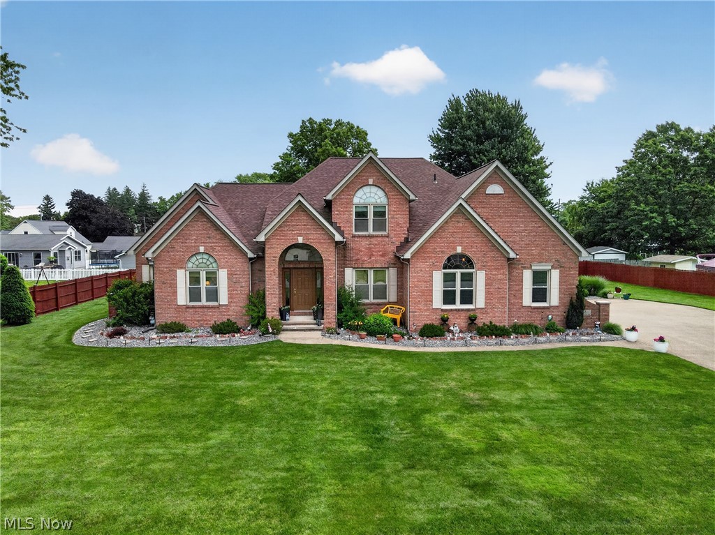 Incredible 4 bedroom 2.5 bath custom built 3,400+ sq ft brick beauty set on a picturesque 1/2 acre lot that features an open and recently updated eat-in kitchen, 1st floor laundry and half bath, sunken living room w/gas fireplace, formal dining room w/ beautiful tray ceiling, 1st floor office and a one-of-a-kind indoor kidney shaped heated swimming pool with depths ranging from 3 to 6 feet. Upstairs you're sure to love the 4 spacious bedrooms, master bath w/jet tub and a walk-in closet in the master bedroom as well as in the guest bedrooms. Full high and dry basement that is partially finished, tankless water heater, AC, whole house generator, 2.5 car attached garage w/ Nature Stone floor, large concrete driveway, new roof in 2024, Triple Pane windows, new kitchen appliances in 2023, private, fenced rear yard with concrete patio, deeded Lake Erie Beach Privileges and set on a low traffic street a short distance from Conneaut Twp Park, many outstanding restaurants, boat clubs, wineries and E-Z access to Rte 11 and I-90. Come Fall in Love with 12 Lake Breeze Drive!