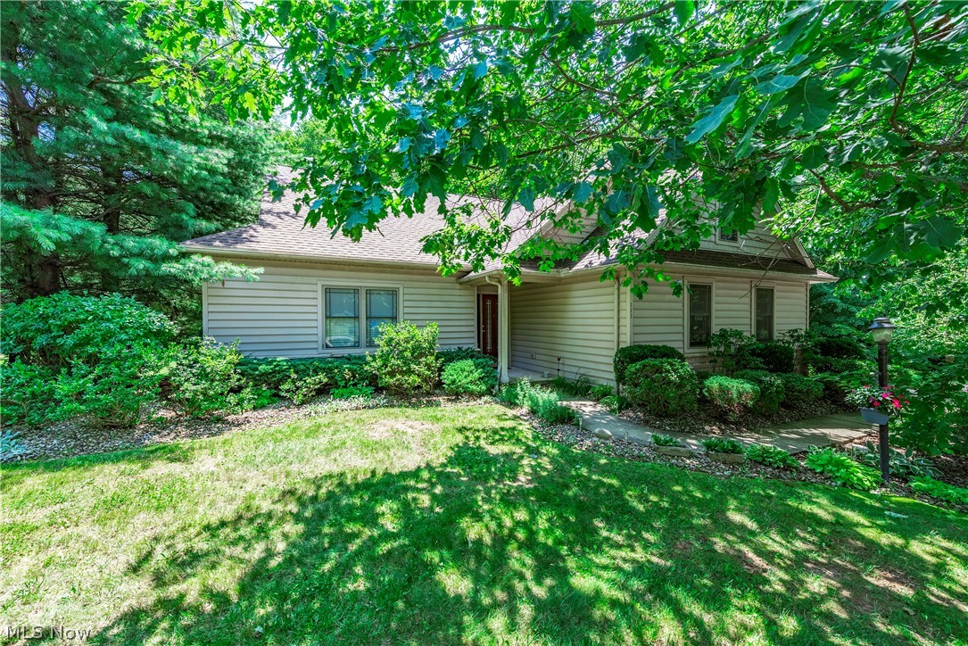 Welcome to easy living in the desirable Strawberry Fields community! This well-maintained cluster home offers a versatile floor plan with 3 bedrooms, 3 full baths, and a half bath. The first floor features a spacious primary suite with a private bath, an additional bedroom and full bath, a comfortable living room with a fireplace, an inviting kitchen and dining area, and a convenient first-floor laundry. Upstairs, you'll find a cozy loft, a third bedroom, and another full bath—perfect for guests or a private retreat. The finished walkout basement adds even more living space with a large recreation room and half bath, ideal for entertaining, hobbies, or a home office. Situated on a beautiful, treed lot in a smaller, peaceful development within the Firelands School District, this home offers the perfect combination of comfort, privacy, and convenience.
