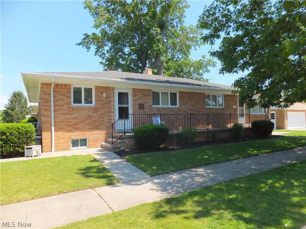 Hard to find BRICK RANCH SIDE BY SIDE DUPLEX,2 bedrooms each suite,excellent condition,newer roof (tear off),1 side has newer furnace,newer h.w.tank,extra full bath and summer kitchen in basement,both suites have central air,2 1/2 car garage w/opener