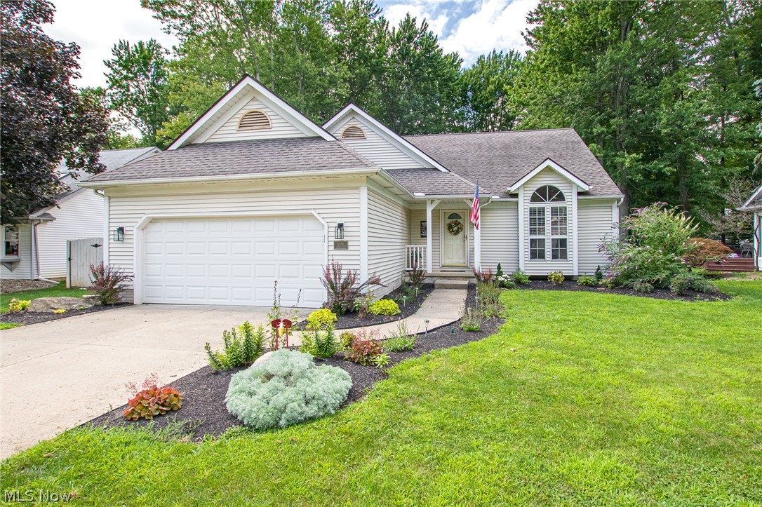 Welcome home to this completely updated 4 Bedroom and 3 Full Bath Custom Built 4-Level Split on a quiet cul-de-sac street in North Ridgeville.  The home is much larger than it appears with over 2,500 square feet of above ground living space plus an additional 721 square feet of finished basement.  The home features a huge remodeled kitchen with white cabinets, plenty of counter space, mosaic tile back-splash, a large breakfast island with seating, a coffee bar station, and plenty of storage.  LED recessed lighting has been added to the vaulted ceilings and newer luxury vinyl tile runs throughout the kitchen and large dining area.  The upper level features the Master Suite with walk-in closets and a Master Bath with a jetted tub, separate shower, dual vanity and heated floor.  The upstairs is complete with 2 additional bedrooms and full bath. On the lower level, the large Family Room is the perfect place to relax by the lovely stone fireplace with a gas insert.  Completing the lower lev