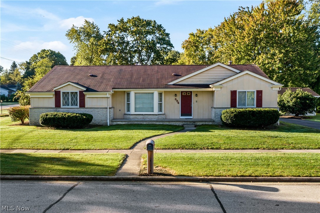 Corner lot ranch home located in Tallmadge Woods allotment. Blocks from High School & Tallmadge Rec Center.  Car enthusiasts will enjoy the attached deep 4 car garage & 1.5 detached garage. Huge clean & dry waterproofed basement partially finished with bath. Plenty of natural light to read your morning paper in the Sun Room located right off of the family room, open to the kitchen. Large master bedroom with private bath. Living room in front of house with bay window, next to dining room. Whole house fan will help control your utility bills in the summer and fall. Call to schedule your private tour!