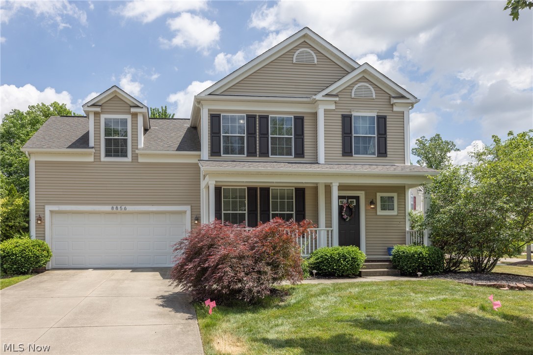 Welcome to this beautifully maintained, move-in-ready home on a lushly landscaped lot near a quiet cul-de-sac in Whispering Woods. Enjoy morning coffee on the covered front porch before stepping into a bright, open-concept floor plan designed for modern living. The spacious family room features a cozy fireplace with elegant built-in shelving and flows seamlessly into a stunning eat-in kitchen with gleaming granite countertops, stainless steel appliances, abundant cabinetry, and a sunny breakfast nook with sliding glass doors. A classic formal dining room provides the perfect setting for hosting! Upstairs, find 4 generously sized bedrooms, including a vaulted primary suite retreat with a private en-suite bathroom and large walk-in closet. The versatile 4th bedroom is currently a fantastic bonus room—ideal for a home office, playroom, or media room.  The full basement can be finished to your liking. Outside, summer gatherings are a breeze on the brick patio overlooking the serene backyard. Complete with a 2-car attached garage, ample storage, and crisp neutral decor, all you need to do is unpack. Beyond the home, enjoy the unbeatable Twinsburg lifestyle! Situated halfway between Cleveland and Akron, with easy access to I-480, commuting is a breeze. Residents love the highly-rated Twinsburg City School District and exceptional local recreation. You are minutes from Liberty Park's stunning trails, a state-of-the-art fitness center, great dining, and shopping. With its welcoming atmosphere and traditions like the Twins Days Festival, Twinsburg is the perfect place to call home.