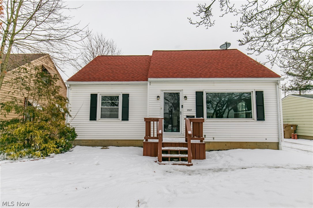 This beautiful cape cod is located in the heart of Cuyahoga Falls and is ready for you to move in! The living room has a ton of natural light shining through the large bay window. A cozy dining area with a window to look into the stunning kitchen!  The fully remodeled kitchen features new white cabinetry, updated backsplash, updated light fixtures and overlooks the family room. This family room boasts an impressive fireplace, and sun lights that allow that sunshine to shine down! Four nicely sized bedrooms with fresh paint! The basement has a charming bar with a nice size area for a rec room. A tranquil backyard with a fence for your fur babies! This lovely home has fresh paint throughout, refinished hardwood, new carpet, a new fridge, and is located close to the Portage Trail shops and restaurants! Do not miss this one because it will not last!