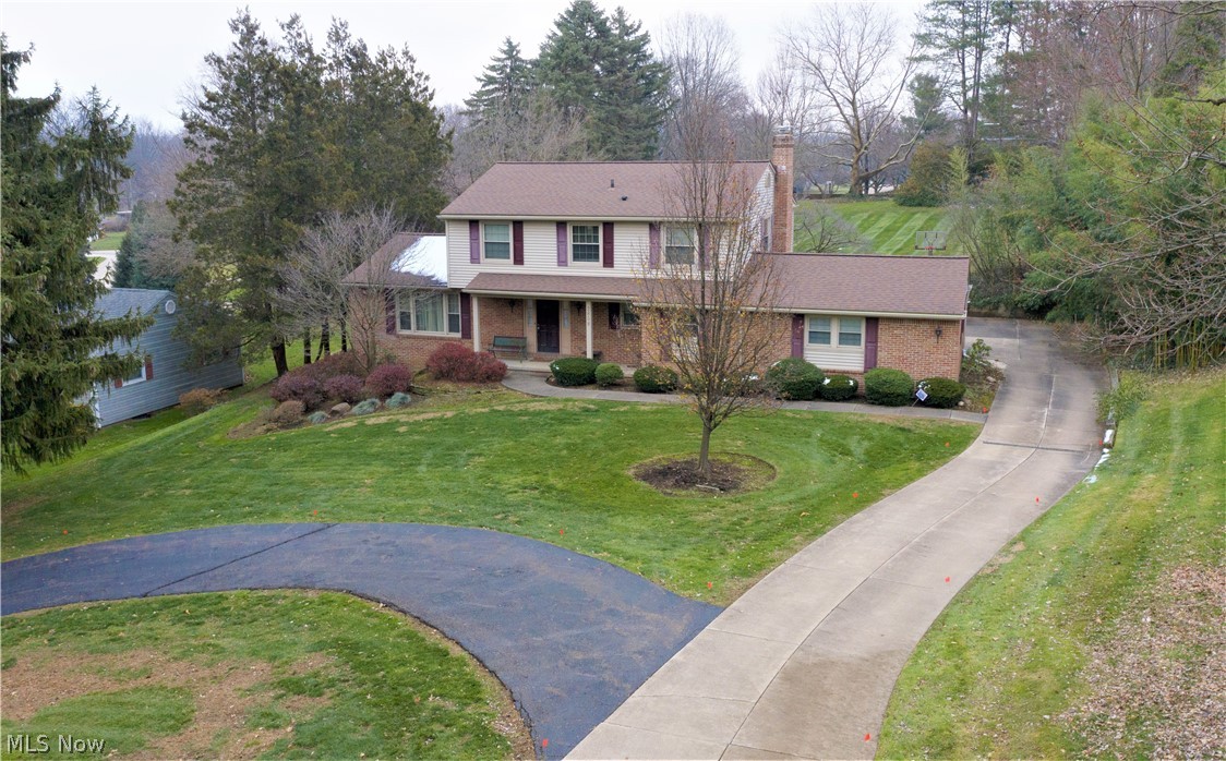 This well maintained Colonial parsonage, offers over 3500 sq ft including the partially finished LL & sits on a .64 acre lot with add’l asphalt circular driveway & rear loading 2 car garage. This 4BR, 2.5BA home has newer windows, roof /electrical panel & includes a 1st floor laundry/mudroom with entry from garage and half bath just off the hall. The Kitchen includes newer wall oven & counter range, pantry & desk. The dinette has a Pella slider to the deck w/ porch swing overlooking the huge back yard. The family room also has Pella slider to the deck along w/ gas fireplace & built-ins. The elegant sizable dining room w/ chair railing & crown molding, large living room w/ crown molding off the tiled foyer w/double closet, completes the 1st floor. The wrought iron staircase leads to 2nd floor landing w/ linen closet, 4 bedrooms, 2 full baths, including master suite w/newer carpet, 2 closets including a walk-in, newer features in the master bath including the ceramic surround shower & du
