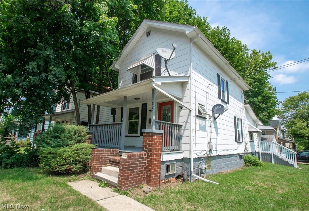 Hidden gem on the westside- it's a must see!  This beauty features a spacious main floor with classy living room, large updated eat-in kitchen, formal dining room and sunroom/porch area in back, all with new vinyl plank flooring. Spacious bedrooms with new carpeting and gorgeous full bathroom upstairs- all with new carpet and flooring, full basement with half bath, separate shower, laundry area, extra rooms and ample storage space. New fixtures and fresh paint throughout. Spacious two car garage, covered front porch and situated on a corner lot.. opportunity awaits for many. Hurry in before it's G-O-N-E!