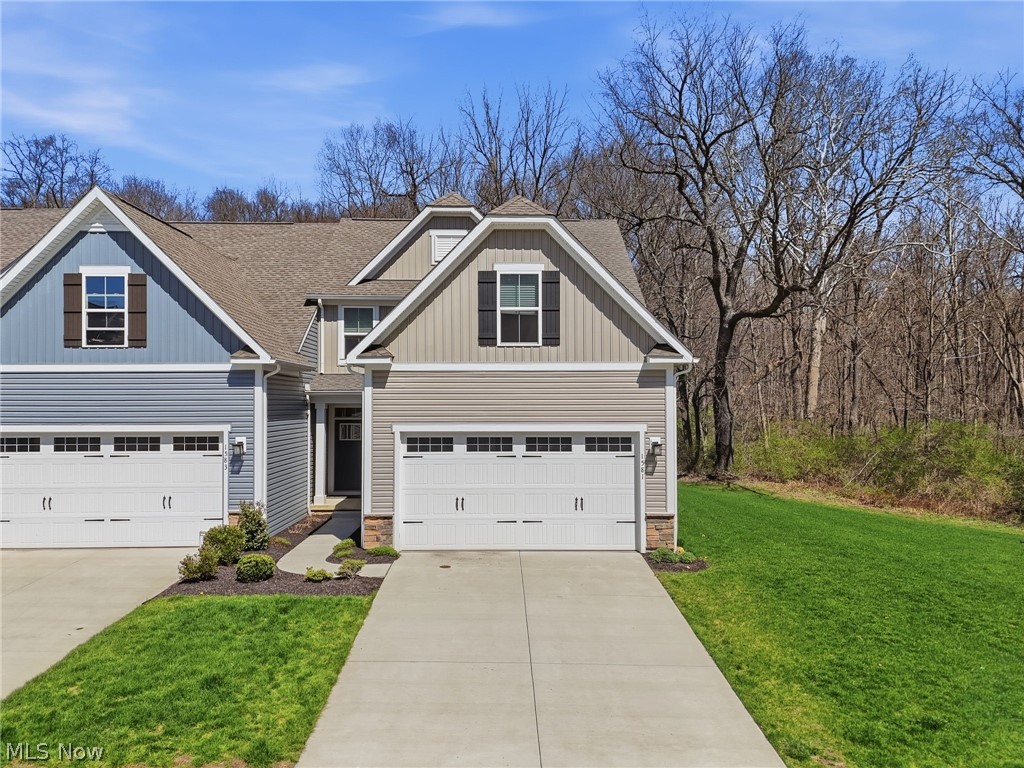 Welcome to 1581 Mud Brook Ct! A beautifully situated townhouse offering comfort, convenience, and one of the most scenic settings in the area. This well-maintained home built in 2022 features a bright and inviting layout with spacious living areas, generous natural light, and thoughtful design throughout. The kitchen flows seamlessly into the main living space, making it perfect for both everyday living and entertaining. First floor master suite, separate first laundry room, and a first floor half bathroom gives you everything you may need on one floor! Upstairs bedrooms along with a full bathroom are comfortably sized, and the home offers ample storage along with modern conveniences. On the lower level you’ll find an unfinished basement just waiting for your own personal finishing touches! Equipped with plumbing for a bathroom and an escape window for 4th bedroom! Step outside and you’ll immediately notice what truly sets this property apart! One of the standout features of this townhouse is its exceptional location backing directly to the West Creek Conservancy and Ohio & Erie Canal Towpath Trail. Enjoy a stunning, peaceful view of the towpath and creek right next to the property from the TimberTech back deck! A rare and highly desirable setting that offers both privacy and a connection to nature. Whether you're relaxing on your deck, enjoying morning coffee, or unwinding at the end of the day, the tranquil scenery creates a truly special living experience. With easy access to walking, biking, and outdoor recreation, this home is perfect for anyone who values both convenience and natural beauty. Don’t miss the opportunity to own a townhouse with one of the best views in the Merriman Valley!