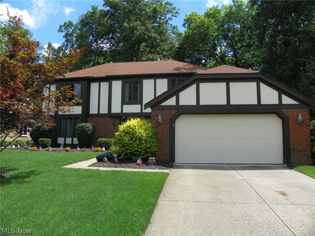 Tudor style Colonial * 4 Bedrooms and 2-1/2 Baths * New carpeting throughout * Inviting ceramic tiled Foyer * 1/2 Bath off Foyer * Crown molding * Ceiling Fans * Newer HVAC (2019) * Interior and exterior of home painted in (2019) *  Cozy Family Room with a WBFP, dry bar, and doors that lead to the park like/private fenced backyard * Appliances remain *  Large Kitchen with eat in space and stainless steel appliances * Formal Dining Room * First floor Utility Room * Spacious Bedrooms on the second floor * Master Bedroom has vaulted ceilings, a gorgeous updated Full Bath with a WIC, tub, shower and plenty of natural light from the skylight * Full Bathroom off the second floor main hallway * Patio area *  Nicely finished Basement Recreation Rooms * Tons of storage * This home has been well kept and is clean and move in ready !