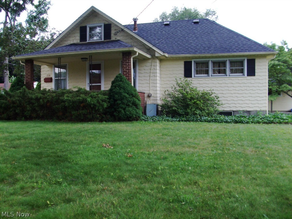 Excellent opportunity! Feels much bigger than you expect it to because the living room and eat-in kitchen are very roomy.
3 Bedrooms, 2 are small but a built-in bed and storage area helps and there is upstairs storage in the walk up attic.
Garage is 2 car size, but single door with 1/2 used for work area and storage. A covered patio is attached and looks out towards the extra lot, which has a drive for added parking when you need it. Basement and kitchen are easily accessed from the driveway.
Rec room in basement with closet areas, and a full bath in the unfinished side.
Roof was replaced in approx. 2007
Lot size approx. 90X120 please have agent verify.