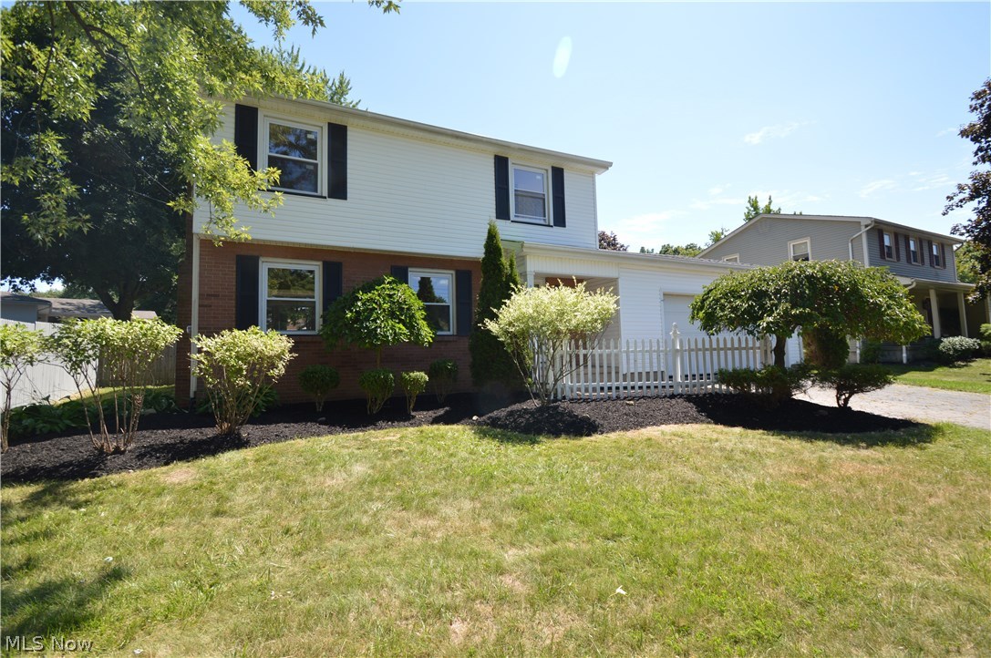 Updates galore in this spacious Boardman home.  The main level plays host to a totally remodeled maple kitchen with stainless steel appliances, large living room with fireplace and hardwood floors, formal dining room, and newly updated half bath.  Three bedrooms with refinished hardwood floors and a brand new full bath comprise the second level.  A full basement with family room provides additional living space and ample storage.  Additional updates include new windows, all new fixtures, paint, and more.  Exterior features include a two car attached garage, front porch, and large fenced rear yard.  This home is turn key and move in ready.  Call today!!