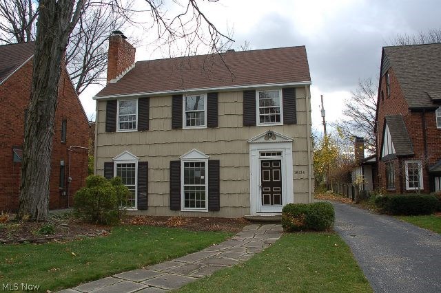 Lovely Shaker Style colonial features everything your buyer will love! Fresh paint, electrical panel, garage door, hot water tank, most plumbing and roof just completed last month! Classic style throughout, includes hardwood floors, built ins in the living and dining rooms, a second fireplace in the master bedroom, moldings and more. The finished basement offers a family room and modern half bath, the attic offers plenty of storage. The beautiful home is move in ready! An absolute must see!