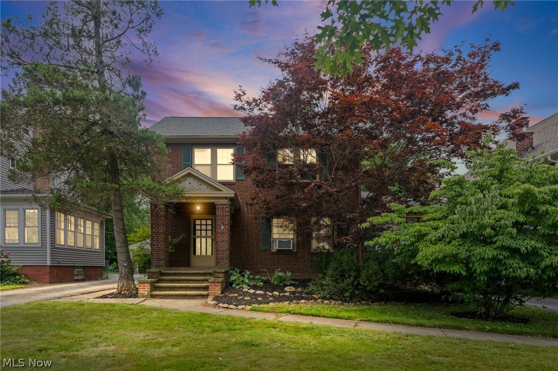 Welcome to an attractive 1400+ square foot 3BR, 1.5BA brick colonial nestled in the heart of the coveted Cedar Lee Art District, a pleasantly walkable corridor of Cleveland Heights bustling with shops, eateries and so much more! This brick beauty with attractive and pillared 8' x 8' front porch abounds in curb appeal and a highly desirable and sprawling rear yard where mature plantings and sculpted beds await your green thumb to truly make this inviting outdoor space an Edenic masterpiece! Updated, generously sized vaulted Kitchen with skylights features a great abundance of white shaker-style cabinetry, an expansive, uninterrupted run of solid surface counters to empower your culinary exploits, SS appliances (gas cooking) + a separate "coffee station" to start your mornings! Formal Dining Rm and the adjoining Living Rm with attractive crown moldings and fireplace make for a seamlessly flowing floorplan, perfect for entertaining and day to day living. A quaint and bright Sunroom off the Living Room is an ideal space for relaxation, an office or playroom. Three Bedrooms upstairs share a spacious full and updated Bath with sizeable in-suite closet. This home features neutral carpeting and paint on the second floor and lustrous, beautifully finished oak flooring on the first floor. Washer/Dryer are in the unfinished basement with cavernous storage, glass block windows + convenient Half Bath. Detached 2-car garage w/ plenty of space behind and a full privacy fence encloses the rear yard as does a driveway gate. Brick Patio and attractive French Door Kitchen Entry at rear of home. POS will be completed by TT. Roof/Skylights '26; Furnace '18; H20 Tank '22. Enjoy close proximity to Cain Park for its legendary art festivals and concerts, and stroll the neighborhood to discover over a dozen countries' cuisines all within a ten minute walk...not to mention the short drive to Little Italy and all the cultural gems of University Circle & so much more! 1 year Home Warranty.