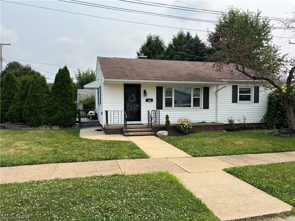 One owner home, very well loved and cared for. 2 bedroom, 2 bath situated on one lot 50 x 70 with additional lot of record 49.5 x 70, alley bound.  Home is neat and clean with full basement, close to school and downtown.