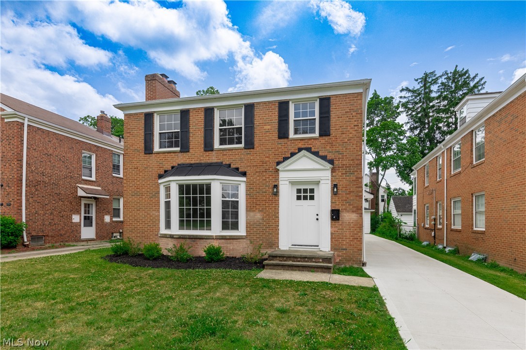 Welcome to this professionally renovated 4-bedroom, 2.5-bath brick Colonial in the highly desirable Lomond neighborhood of Shaker Heights! Conveniently located within walking distance of Lomond Elementary School, parks, restaurants, and shopping, this move-in-ready home offers exceptional craftsmanship and modern updates throughout.

Step inside to find gleaming refinished hardwood floors throughout the first and second floors, an inviting living room with a fireplace and bay window, and an open floor plan perfect for today's lifestyle. The formal dining room flows seamlessly into the expanded kitchen featuring abundant custom cabinetry, a center island with sink, generous counter space, and a spacious eating area. Seller is offering a $3,500 appliance allowance so the new owner can choose their preferred appliances.

The flexible first floor also includes a bedroom, ideal for guests or a home office, plus an updated half bath. Designer lighting, recessed lighting, new windows, and quality finishes are found throughout the home.

The open staircase leads to a spacious owner's suite with a walk-in closet and private full bath. Two additional bedrooms, a second full bath, and a cozy sitting/reading area complete the second floor.

The finished lower level provides additional living and entertaining space, along with a large utility room offering abundant storage.

Outside, enjoy the new concrete driveway extending from the street to the newer garage with a convenient turnaround pad. Zoned heating and cooling with two gas furnaces and two central air conditioning systems provide year-round comfort.

An exceptional opportunity to own a beautifully renovated home in one of Shaker Heights' most sought-after neighborhoods.