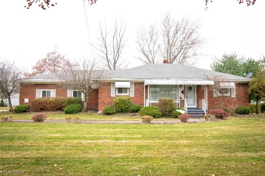 Well-taken care of brick ranch with basement in Bedford Heights. This lovely home features hardwood floors in the family room, all 3 bedrooms. The kitchen has been updated with stainless steel appliances, tile, granite countertops, main bathroom has been updated in recent years as well. Partially finished basement features recreation space and a bar area. Off the dining area, you will find a great size patio and over half acre fenced in yard to enjoy BBQ and parties during warm days/nights, attached 2 car garage is a very good size (fridge and deep freezer are staying). Come see this great property that has been loved for years by the Owners and make it your new Home Sweet Home!