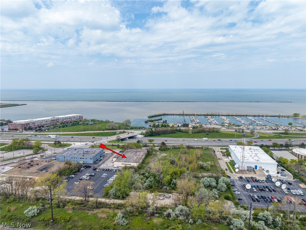 All information provided in listing not guaranteed and to be verified by purchaser. 
Per county records property is @20,757 sq ft with @2,563 sq ft in office space with the balance in one story warehouse.
There is one drive in door @16' x 12'. Clear ceiling height estimated @15-16'
Property is located off E. 55th street close to I-90 exit with easy access to all freeway locations. Lake Erie view.