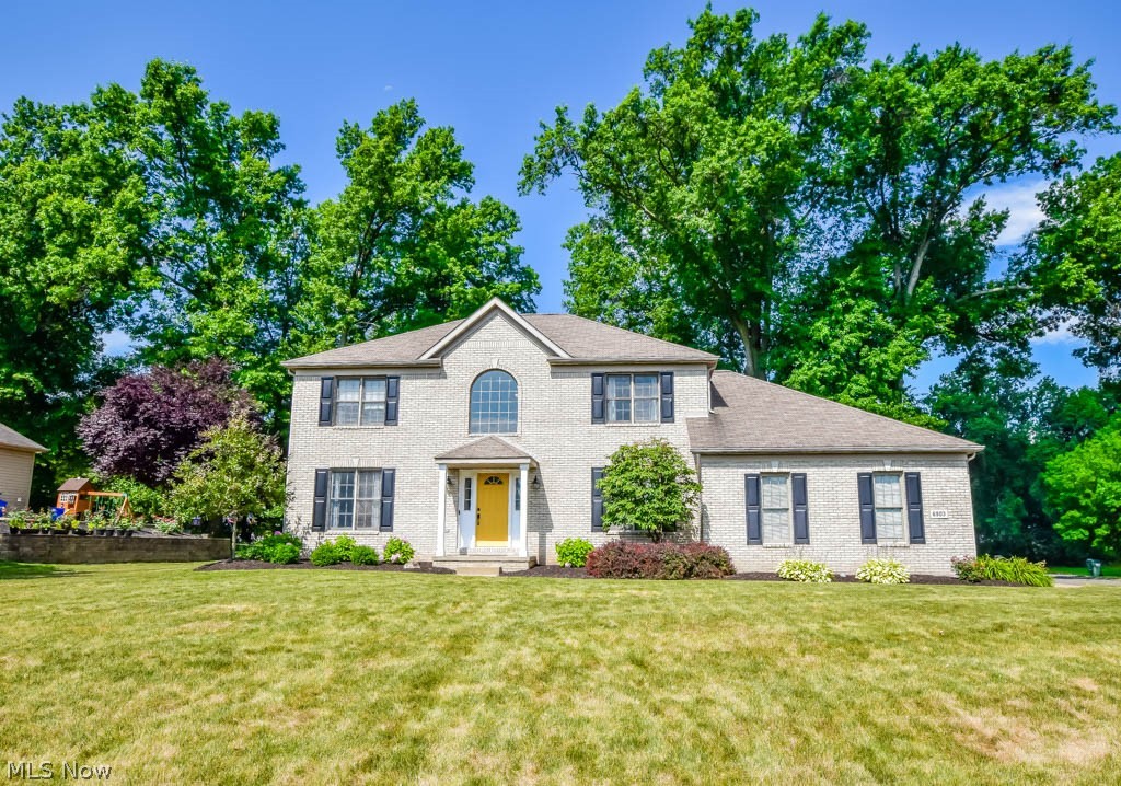 This stately colonial sits on a large corner lot with beautiful landscaping and fantastic curb appeal! Step inside to the 2 story foyer with a turned staircase and double coat closet. Just off of the foyer you'll find a home office with French doors that open to the living room with a corner gas fireplace. The well-planned kitchen is fully applianced including a new dishwasher and offers space for casual dining with a full view patio door to the tree-lined backyard with a shed. The formal dining room adds the perfect spot for hosting holiday meals. In the hall leading to the 2 car side load garage, you'll find a full bath with a shower and a laundry room with cabinets for storage and a utility sink. Upstairs are three great bedrooms and 2 full baths. The owner's suite features a walk-in closet and a private bath with a soaking tub, double vanity and a separate water closet and shower area. If you like to entertain, you'll appreciate the finished lower level complete with a family room