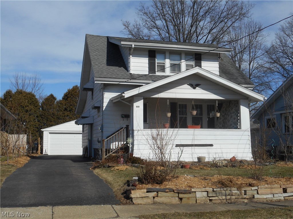 Very nice charming, 3 bedroom colonial offers 1st floor bedroom, hardwood floors throughout most of the home, huge eat in kitchen featuring plenty of cabinet and counter space (appliances convey), & fireplaced living room.  Enjoy the open porch this spring and summer!  Oversized 2 car garage with door opener.  Spacious bedrooms and nice closet space.  There are several  plants and trees on the property (raspberries, strawberries, plum trees, fig trees, black-eyed Susan...just to name a few.  A complete list can be provided for the buyer). Updates include:  A/C replaced in 2014; Hot Water Tank replaced in 2013.  Home Warranty for added peace of mind.