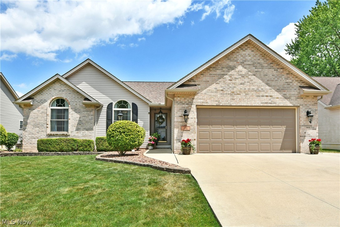 Find excellence in style, design and comfort as you explore the two floors of remarkably finished living space found within this stunning Howland home! Hidden away in a quiet neighborhood near a dead end, cul-de sac; this residence embraces the serenity to match its looks. That’s saying a lot, because this ranch style layout is a definite showstopper with its handsome brick frontage, manicured stonework and adjoining landscaping; all paired with a must-see fenced-in backyard that’s ready for summertime fun. Kick back on the raised deck or lower patio before sitting fireside as the night wanes on. Step inside as the deep-set foyer opens to a resounding great room, brimming with tall, skylight adorned ceilings and plenty of color to offset the sleek, hardwood styled flooring below.  Central living space joins a window lined sunroom with its unique, arch topped fireplace and elaborate mantle. Formal dining follows suit with design elements as it overlooks the masterfully appointed kitchen and its tiered, stone topped island. Down the main hall, a trio of brightly lit bedrooms are met by a delightfully accommodating full bath. The oversized master suite enjoys its own full private bath with a stall shower, spa style tub and walk-in closet. Downstairs, the finished basement continues to impress with lounge areas, a bonus bedroom, bonus office and full lower bath. Hidden storage completes the package.