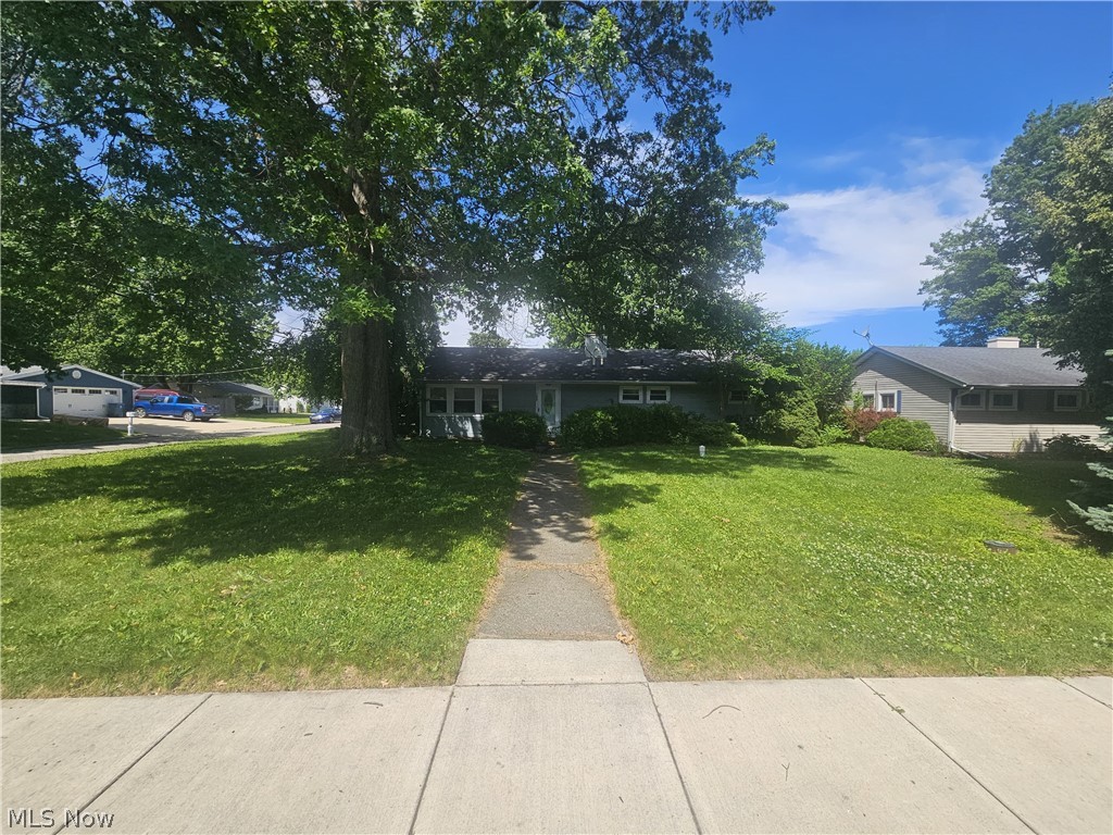 Welcome to 1000 Sanford Street in Vermilion! This beautifully updated home has undergone significant improvements designed for modern living. Recent renovations include all-new flooring throughout, updated appliances, and a remodeled main bathroom featuring a stylish stand-up shower. Interior walls have been thoughtfully removed to create a more open, functional layout that enhances both daily living and entertaining.

The property also features a heated two-car garage, providing year-round convenience and comfort. Situated on a desirable corner lot, the home offers exceptional outdoor living with a beautifully maintained front yard and a fully fenced backyard. Enjoy summer barbecues on the spacious concrete patio while still having plenty of green space for children, pets, and outdoor activities.

Located just minutes from Vermilion's lakefront dining, entertainment, and nightlife, this home offers the perfect balance of relaxation and recreation. Families will appreciate the proximity to Vermilion Schools and the welcoming small-town atmosphere that makes it easy to build lasting friendships within this close-knit community.

Don't miss your opportunity to own a move-in-ready home in one of Vermilion's most desirable locations!