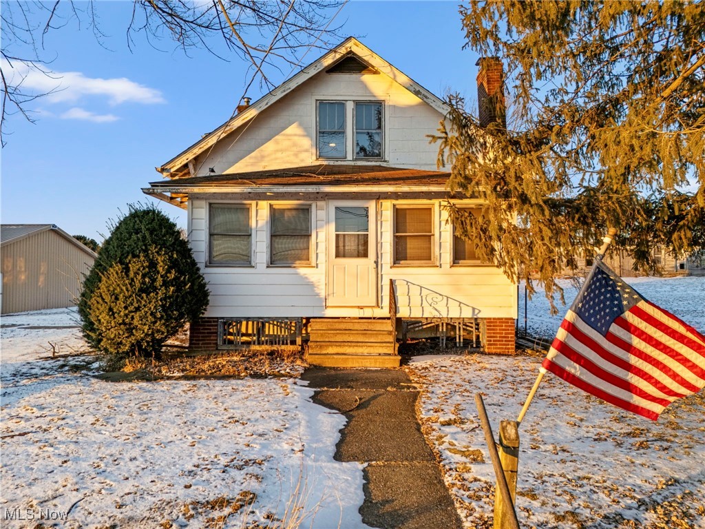 Located on an extra large lot with acreage, 10595 Forty Corners offers a rare opportunity for buyers looking for space, functionality, and long term potential. This 3 bedroom, 1 bathroom home features original hardwood flooring, a spacious kitchen, and a three season front porch that adds additional living space and a welcoming entry to the home. The property will require TLC and is ideal for buyers ready to renovate and build equity.

Outside is where this property truly stands out. A large, newer garage outbuilding with tall ceilings and double garage doors provides excellent space for vehicles, equipment, or workshop use. Additional outbuildings include a horse barn and chicken coop, both in need of repair but offering great potential for hobby farming or storage.

The home is serviced by propane heat, a private well, and a septic system, with both the septic and furnace being newer major improvements. With generous acreage, multiple outbuildings, and room to grow, this property presents a unique opportunity for buyers seeking land, flexibility, and future potential.