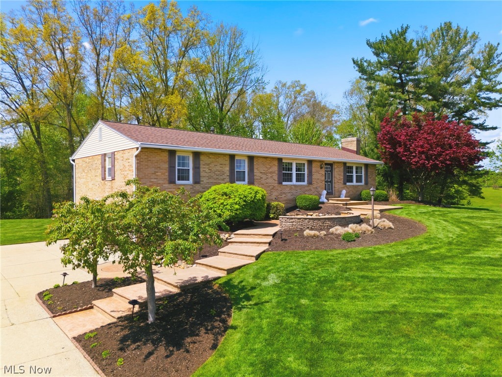 Welcome to this beautifully maintained, one-owner all-brick ranch set on a scenic 1.8-acre lot in desirable Jackson Township. Offering 3 bedrooms and 1.5 baths, this home combines timeless construction with thoughtful updates throughout. The property features a gorgeous yard with a sprinkler system, along with custom concrete patios and walkways—perfect for relaxing or entertaining. Inside, you’ll find a well-cared-for interior with newer windows and updated systems, reflecting pride of ownership. The lower level includes a cozy library space, ideal for a home office, reading retreat, or additional living area. A two-car garage adds convenience and functionality. Major updates include a new roof in 2024, along with updated mechanicals for added peace of mind. This home has been meticulously maintained and is move-in ready. Enjoy the space, quality, and charm of this exceptional property—schedule your private showing today!