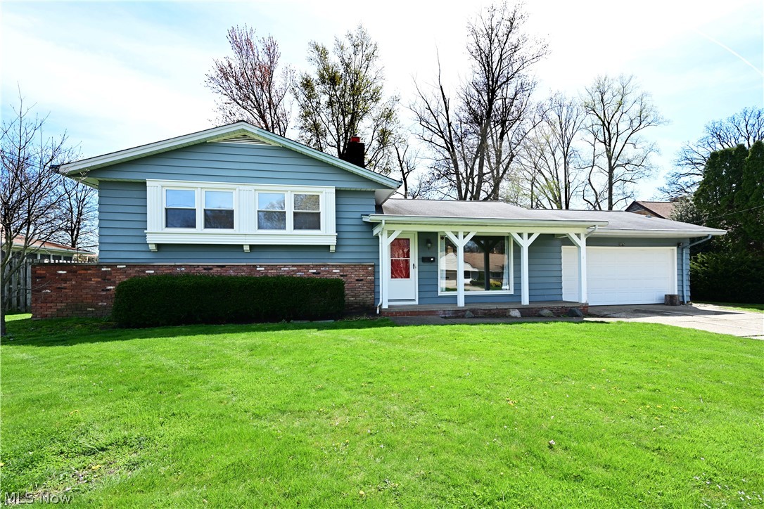 AMAZING 3 bedroom and 2 full bath split level in the center of Rocky River! This quality built split features gorgeous newly finished hardwood floors and fresh painted walls throughout! The Living Room will immediately impress you with its generous size, full wall wood/gas burning fireplace, large picture window and high vaulted ceilings. The Dining Room's French doors open out to the Patio and lovely fenced in Backyard. The Kitchen Features spacious counters and cabinets and the sky light windows let plenty of natural light in. The lower level features a Family Room that is a beautiful additional entertaining space with recessed lighting and brand new carpet. There is also a full bath. The roomy bonus/laundry room has many possibilities. The upper level features 3 nice size bedrooms with a lot of storage. The newly renovated bathroom has beautiful ceramic tile floors with a granite double sink vanity. Two Car Attached Garage has Plenty of Storage. Furnace, AC 2024 and Hot water tank 2024. Great location near shopping restaurants, parks and schools. This is a Great Place to Call Home!