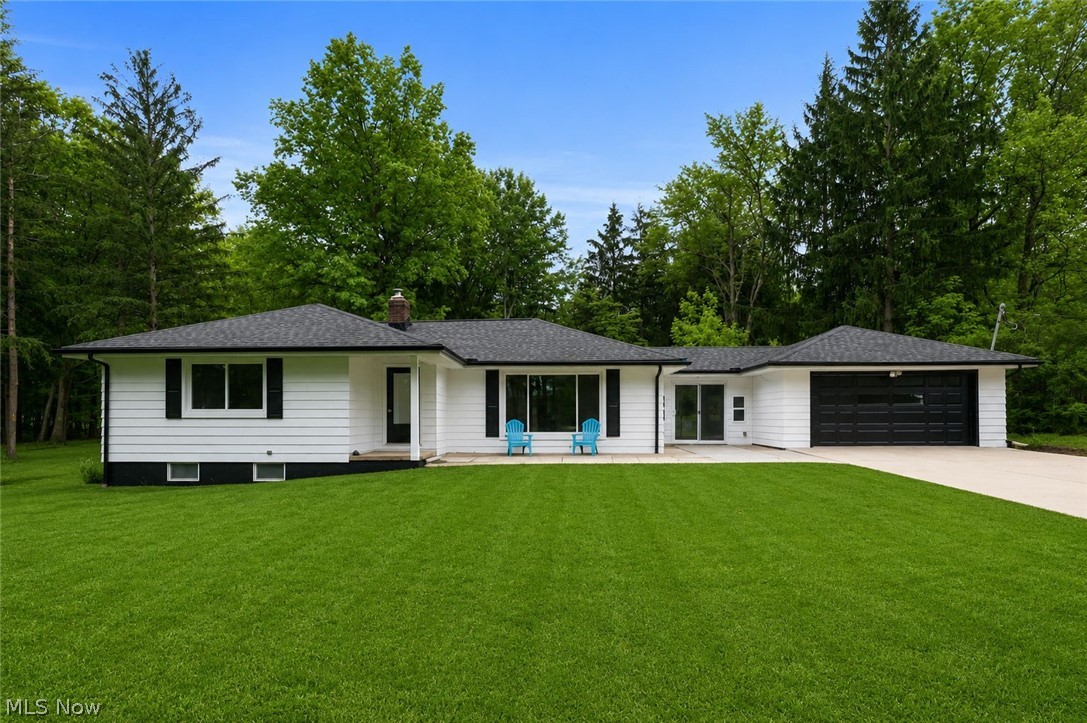 Welcome home to this beautifully remodeled ranch situated on 2.73 acres! This spacious home offers 3 bedrooms on the main level, 2 additional bedrooms downstairs, along with a full bathroom on each level. Recent updates include new flooring, fresh paint, and updated electrical throughout the home. The stunning kitchen was renovated in 2026 with new cabinets and countertops, while both full bathrooms were also completely remodeled with all new fixtures and vanities. Major mechanical updates include a furnace  (2020), hot water tank (2022), roof (2019), and new windows installed in 2025. The driveway and the backyard cement pad were added in 2023, and new gutters were installed in 2026. Additional features include a 200-amp electrical panel in the garage and the rare bonus of bow hunting being permitted in the backyard. This move-in ready property offers the perfect blend of modern updates, space, and country living.