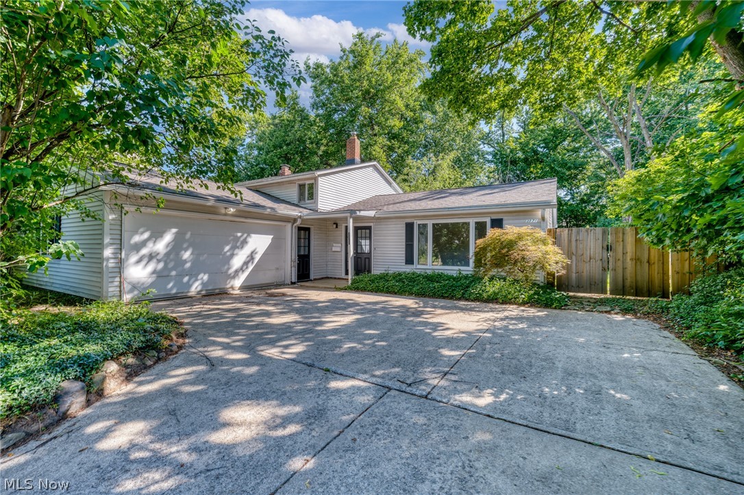 Welcome home to this beautifully updated split level perfectly positioned in one of Shaker Heights' most sought after locations. Step outside and you are walking distance to the Van Aken District, a vibrant destination filled with luxury shops, restaurants, coffee shops and more, all while enjoying the tree lined streets and community charm that make Shaker Heights one of the most beloved communities in all of Northeast Ohio.
The open concept main level welcomes you with gorgeous parquet floors in the living and dining room. The dining room opens to a fully fenced backyard through sliding glass doors, perfect for entertaining. The eat in kitchen features white cabinets, ample counter space, stainless steel appliances and two skylights that fill the space with natural light. A second set of sliding glass doors leads to a brick paver patio, giving you two separate outdoor spaces to enjoy.
The lower level offers new LVP flooring, a cozy brick fireplace with built in shelving, a fourth bedroom and a beautifully renovated full bath, giving this level a flexible and functional layout that works for families, guests or a home office setup. Upstairs you will find three spacious bedrooms with generous closets and a second stunningly renovated full bath.
New roof (April 2026), freshly painted throughout in warm neutral tones and an attached garage rounds out everything this home has to offer. This home is completely move in ready.
A location this good paired with updates this thorough does not come around often. Schedule your showing today!