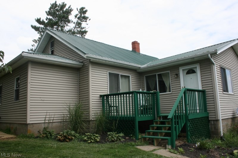 This house sits on 2.5 acres and has a lot to offer for the price. Newer windows, roof and siding. New kitchen cabinets, floor and appliances. Bath has been updated. New water heater. possible 4th bedroom if attic was finished. French doors off the kitchen opens to a deck with great views of the private 2.5 acres. There is also a barn for storage on the property. Possible 3 car garage. Mineral rights do not transfer.