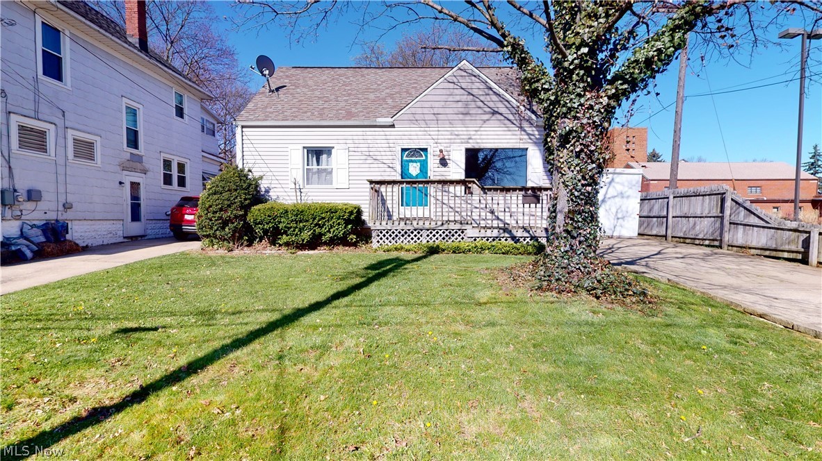 Cute, unique Cape Cod with bedrooms on all 3 floors.  First floor has roomy living room with oversized front window, 1st floor bedroom and 1st floor GIANT bathroom that was redone in 2017 with quartz countertop, double sinks, tiled, walk-in shower and separate tub.  Eat-in kitchen was completely redone in 2016 with all stainless steel appliances that stay, touch smart faucet, new cupboards, counters, backsplash, lights, flooring, breakfast bar and slider to deck, patio and partially fenced backyard.  Upstairs is another bedroom and "loft" area that could be dressing area, office space, or your choice.  Lower level has full bath with walk-in shower and two finished rooms currently being used as bedrooms with closets but could be rec rooms, work-out gym, or again your choice.  First and second floors are all hardwood except newer laminate in kitchen, carpet in basement rooms except ceramic tile in bathroom and cement in laundry/furnace area.  Updates include approximate dates: 2012-roof,