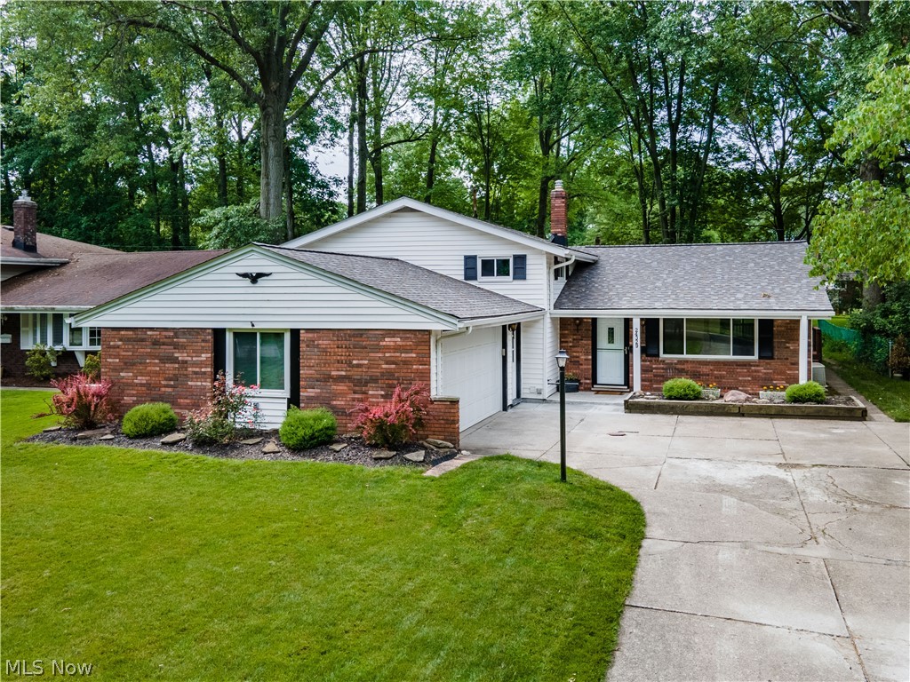 Looking for a home in a convenient location with plenty of space both indoors and out? This is the place! 24329 Carla Ln features 2,304 square feet across three levels, 4 bedrooms, and 2 full baths. The perfect home office space awaits you with not only a bathroom, but also a bar for those long days of zoom calls. Enjoy summer nights on the deck, or summer afternoons in the shade thanks to the treed back yard. All the big items have been recently updated, so just move right in and make this home your own - Roof 2019, Furnace 2019, A/C 2012, Hot Water Tank 2020, Windows ~10 years, Retention wall 2021, Master bath 2011.