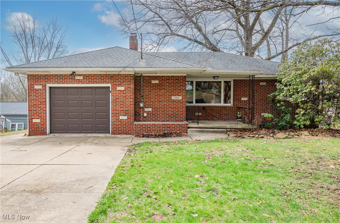 Welcome to this cozy two-bedroom, 1.5-bathroom ranch-style home, where comfort and convenience meet! As you step inside, you'll be greeted by hardwood floors throughout, adding warmth and character to every room. The spacious living room offers a cozy fireplace and leads to the formal dining room. You will find sliders leading out to a large back deck-ideal for entertaining guests or enjoying quiet evenings overlooking your backyard. The kitchen is complete with a beautiful range and new LVP flooring. Two generously-sized bedrooms are conveniently located on the main level, alongside a renovated full bathroom. Head downstairs to the lower level, where you'll find a rec room with a fireplace, half bath, and laundry room. The exterior boasts an oversized backyard and an inviting pool-perfect for those hot summer days. The pool, which features a 10,000-gallon tank and a 21-foot diameter, was added in 2014, with notable upgrades (pool deck 2016, new liner 2022, electric hookup with a gas line installed underground 2015). Additional updates include: Water Meter & Water Service Line replaced in 2022, house deck 2015, kitchen flooring 2025, bathroom remodel 2012, HWT 2024. Don't miss the chance to make this wonderful home yours -schedule your showing today!