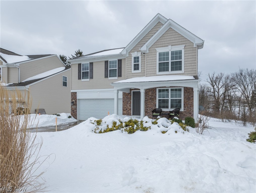 Get ready to fall in love with this move in ready, energy efficient Drees Homes Chester design; A 4 bedroom, 2.5 bath home showcasing a 1st floor master suite, walkout basement & amazing open floorplan, nestled on a quiet cul-de-sac in Strongsville's Echo Lake community w/ a swimming pool, tennis courts, playground, clubhouse & conveniently located near all of Strongsville's great amenities! The exterior boasts a charming front porch. 10ft ceilings, neutral fresh paint & beautiful floors are found throughout the main level, starting with the inviting foyer, flanked by the lovely living room/ office area. The bright & spacious family room opens to the modern eat-in kitchen complete w/ sprawling island w/ seating, granite countertops, ample cabinetry, backsplash, included appliances & walk-in pantry. The dining area boasts a slider out to the large, easy maintenance, 16x16 Trex deck(2018). Private main floor owner's suite w/ vaulted ceiling, walk-in closet & glamour bath w/ double vaniti
