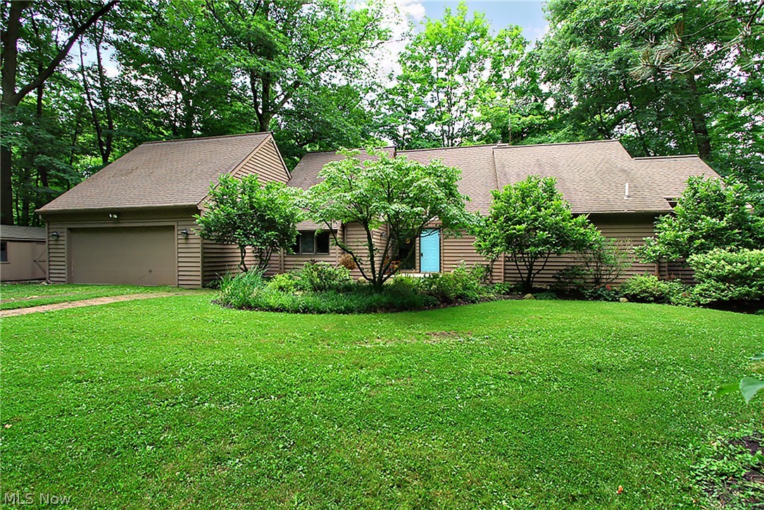 This secluded home sits on a gorgeous, wooded five-acre lot offering exceptional privacy. The primary suite is located on the first floor for easy living. The additional bedrooms and storage are situated on the lower level (1,736 sq. ft.), complemented by the main level and loft (2,847 sq. ft.), totaling 5,208 finished square feet.Recent mechanical updates include: AC External Unit (Compressor): Replaced in 2014, Furnace: Replaced in 2018, HVAC System: Serviced this year, including the electrostatic air filter, Well Pump: Replaced in 2023, Septic System: Replaced this year; includes a three-year prepaid maintenance contract and warranty that conveys to the new owner. Total Roof replacement 2017.  The property also features a pole barn and two additional storage buildings. A folder containing further updates and documentation is available at the home. Room dimensions will follow shortly. Home is located just before the cul-de-sac.