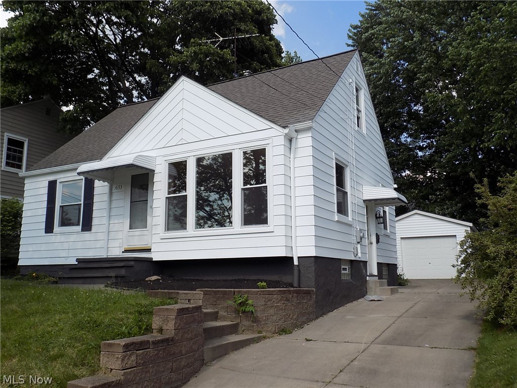 Completely remodeled cape cod 3 bedroom, with a garage and finished basement. This home truly has it all! It features new flooring throughout, windows, lighting, freshly painted walls, doors and updated mechanicals. The spacious kitchen has new cabinets, glass tile backsplash, counter, faucet, and stainless steel dishwasher. The bathroom has new flooring, vanity, toilet, bathtub and ceramic tile shower. Finished basement has fresh paint and new carpet. No detail was left undone in this home.  Furnace and central air to be installed shortly.