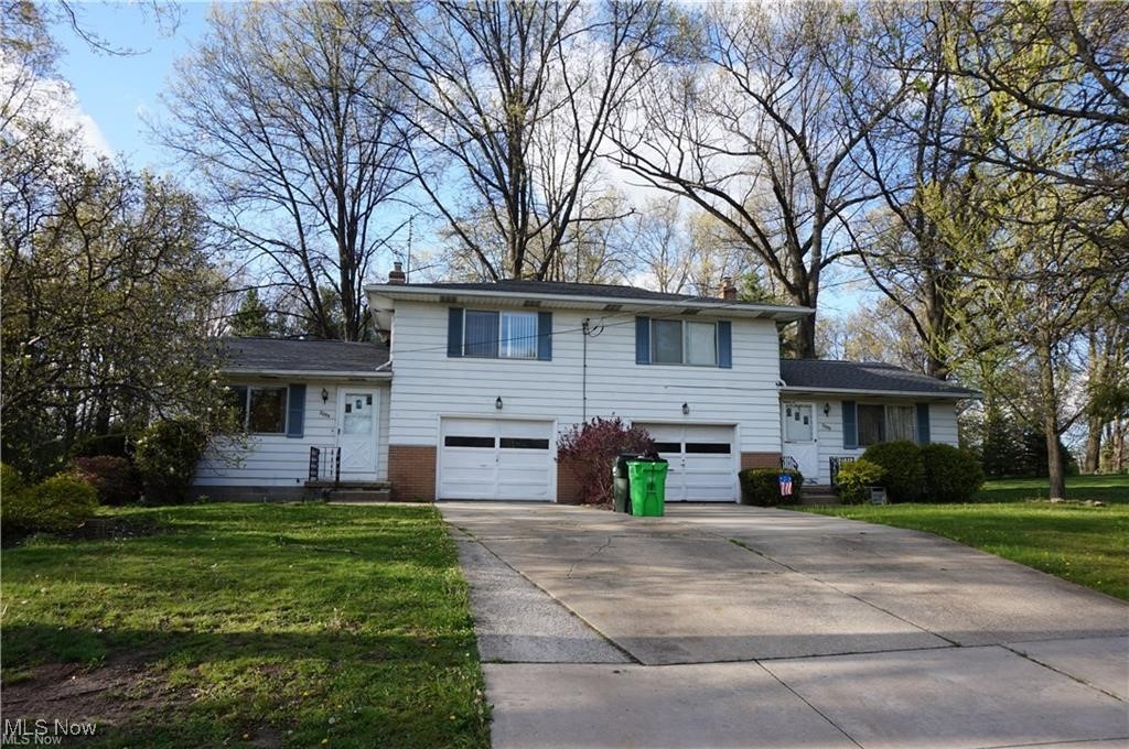 Side-by-Side Twinplex in Stow!  Investors, here's your chance - this property offers 2 bedrooms and 2 full baths each side and attached garage for each unit.  Enjoy steady rental income with established tenants in place. 2055 Has updated laminate flooring and carpet throughout and newer furnace (2019).  2059 Tenants have been there for very long time.
