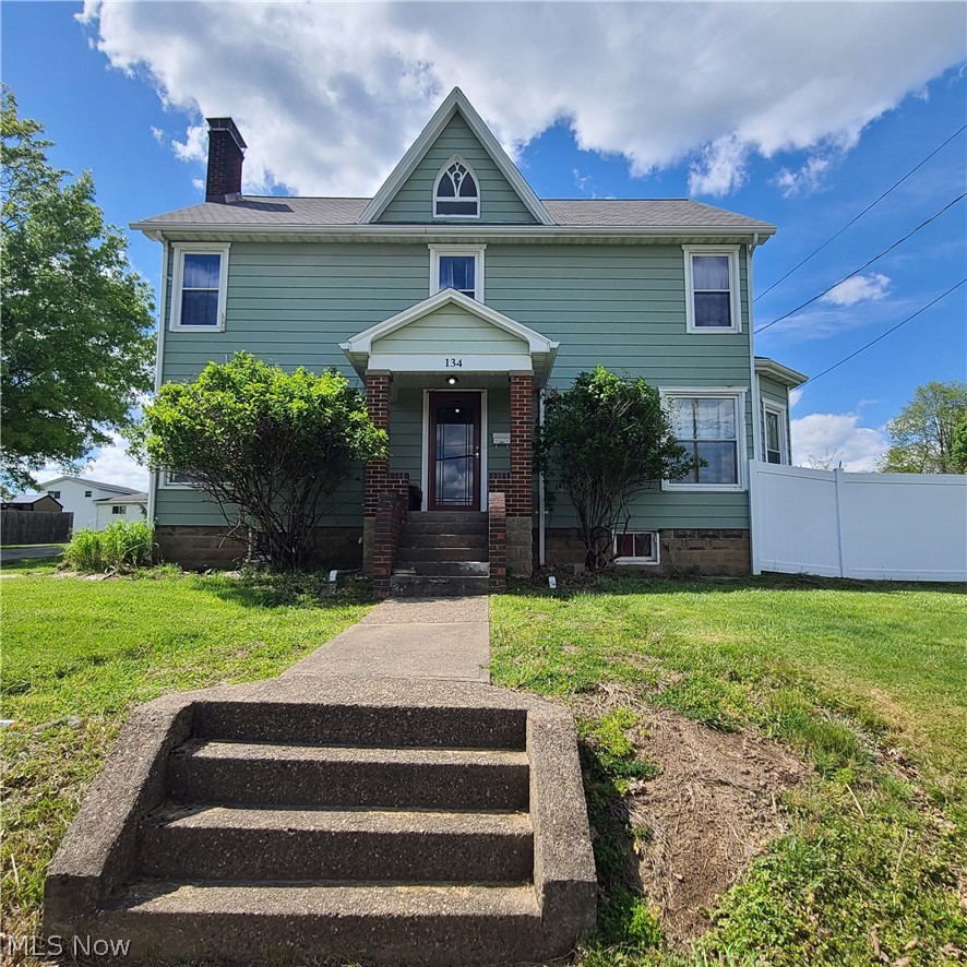Step into timeless charm blended with modern convenience in this beautifully updated 1870 home featuring stunning original hardwood floors, rich woodwork, and a breathtaking staircase that showcases the character of a bygone era. The updated kitchen is designed to impress with granite countertops, a waterfall edge breakfast bar, and stainless steel appliances, while the remodeled bathrooms provide stylish comfort, including a convenient half bath on the main floor. Generous sized bedrooms offer plenty of living space throughout the home. Major updates include a new furnace and central air conditioner in 2024, water heater in 2025, vinyl windows, and a vinyl privacy fence for added appeal and peace of mind. A rare opportunity to own a classic home with modern updates already completed!
