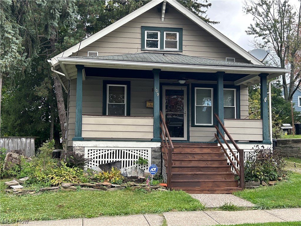This affordable, spacious 2 bedroom, 1 bath home has been well loved and maintained throughout the years.  One car garage, all vinyl tilt-in windows minus two, central air, newer wood blinds, large master bedroom closet, gas heat, leaf guards, and city utilities are nice features to this fully insulated home.  Professionally updated bath offers an expensive pedestal sink, a deep bathtub with a complete tiled surround. You will appreciate the one-of-a-kind unique wood-design patterns in just the right places of this home.  A sturdy home with charming features.  All mechanicals are in good condition. Stove and laundry areas offer gas or electric option. One bedroom up and one bedroom down makes privacy easy.  Window seat in living room with formal dining room that's handy to the kitchen.  Large covered front porch and back wood deck were made for relaxing. Three outside spigots and six outdoor electrical plugs are very handy.  A very clean home with nice hardwood flooring all through the first floor.  Transferable Ohio State fully-waterproofed basement offers more usable space for additional living options,  if desired.  Immediate possession for enjoyable Holiday entertaining.