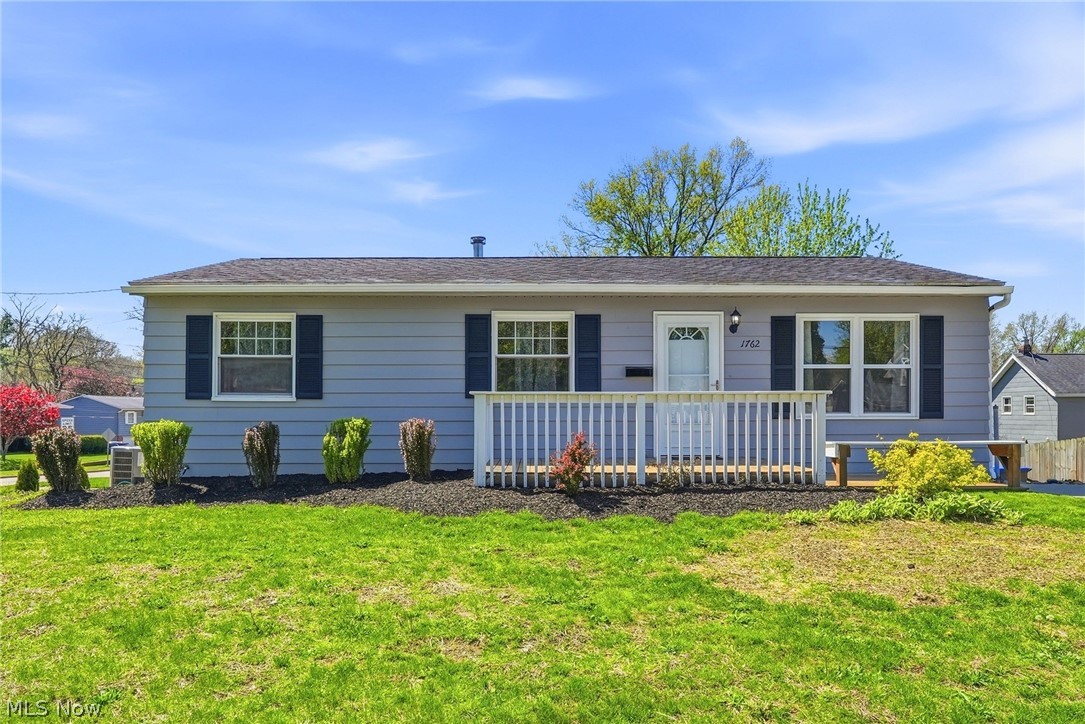You won’t believe your good luck finding this move-in ready, 3-bedroom, 2 bath home tucked away in one of Cuyahoga Falls’ great neighborhoods. Nearly every inch of the home has been attended to with carefully-chosen, modern updates done by Amish craftsmen. It’s ideal for first time homebuyers or anyone looking to make a change, without sacrificing quality. The home greets you with a light-filled living room with new front windows, perfect for enjoying natural light throughout the day. The owner designed the new kitchen exactly the way she wanted it - with quality cabinets, appliances, new windows, lighting, plumbing updates and with a new patio door that leads out to a wonderful deck where you’ll be able to sit for hours with family and friends. If you’ve always wanted two living spaces, you’ll appreciate the carpeted lower-level family room. Not only is it a comfortable space, the owners also added glass block windows and a second full bath with a stand-up shower for added convenience. Providing even more room to stretch out, the home sits on a double, corner lot and has two paved driveways: one at each end, plus a WALK OUT basement that will be super convenient for easily accessing the outdoors, extra parking and it will be great for family gatherings. Everything has been painted, the bathrooms are lovely and right up to date, and the furnace and A/C were even updated in 2024. The location can’t be beat, either. It’s a short drive to all the new eateries and action in the new downtown area, the Natatorium and the Cuyahoga Falls library are close by and Rte. 8 and the new Cuyahoga Falls 6-12 Campus are just minutes away. You won’t want to let this one pass you by!