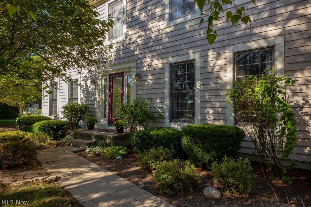 A classic home on a private lot at the end of the cul de sac awaits. Offering hardwood floors and crown molding through the main level. There is a kitchen with crisp white cabinets, an eating island, granite counters, and stainless appliances. Adjacent is a spacious great room with gas fireplace and large windows. The dining room is basked in afternoon light, while across the foyer is a flex room for living, study, or music. The upper level family area has a master ensuite with a spa-like bath, including a double vanity, soaking tub and separate shower. Three addtl bedrooms and a full hall bath complete this level. The 1000 sq ft of basement is ready to finish. A two car oversized garage and mature trees welcome you home while the backyard is a private oasis you won't want to leave.