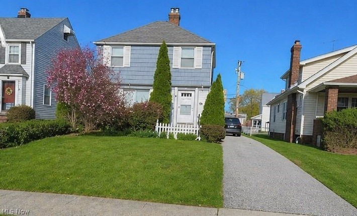 This charming, well-maintained single-family home in Euclid offers the perfect blend of original character and modern upgrades, featuring beautiful hardwood floors and newer mechanicals throughout. The inviting main level boasts a cozy, fireplace-equipped living room and a dining room that seamlessly connects to a rear covered porch ideal for entertaining. The clean, functional kitchen is ready for use, while the versatile lower level provides a dedicated laundry area and a spacious rec room, perfect for a playroom, home gym, or hangout space for pets and teenagers.Upstairs, you'll find two generously sized bedrooms accompanied by a full tiled bathroom. Outside, enjoy a great-sized, inviting backyard on a street with a pleasant, welcoming atmosphere. Located close to Lake Erie, this move-in-ready home truly does not disappoint