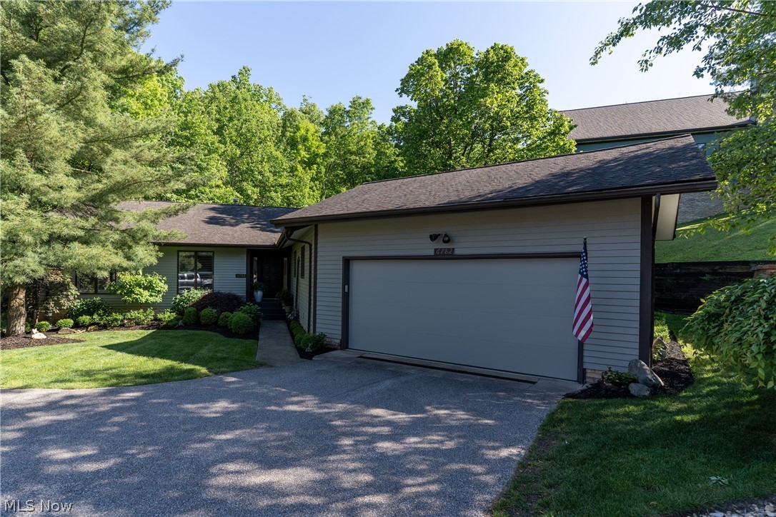 The search ends here for anyone looking for quality, privacy, walkability, and true ranch-style maintenance free living in the heart of Brecksville. Set on one of the neighborhoods best private wooded lots, this remarkable Free standing home has been extensively renovated with nothing left untouched. The craftsmanship stands out immediately. Upgraded trim, casings, crown molding, wainscoting, & built-ins sets the tone for the level of quality found in this home. The main level offers a functional layout boasting nearly 2200 sqft. There is a spacious eat-in kitchen with an abundance of cabinet space, stone countertops, tile backsplash, and upgraded appliance package. Knotty pine ceiling. The main floor also features a Large laundry/mudroom, private office, two bedrooms, and a grand family room featuring vaulted ceilings, a gas fireplace, custom built-ins, and a wall of sliding glass doors leading to the deck overlooking the mature wooded landscape. The finished walk-out lower level adds tremendous value. This is not your average basement. The level of custom finishes doesn't stop upstairs. There is an Additional living room, bedroom, full bath, a flex room, and a large storage room. Additional lower level patio to enjoy. Newer Andersen windows and sliding doors, HVAC within last 5 years. This is a rare opportunity to own a beautifully finished, low-maintenance home in one of Brecksville’s most desirable and walkable locations.
