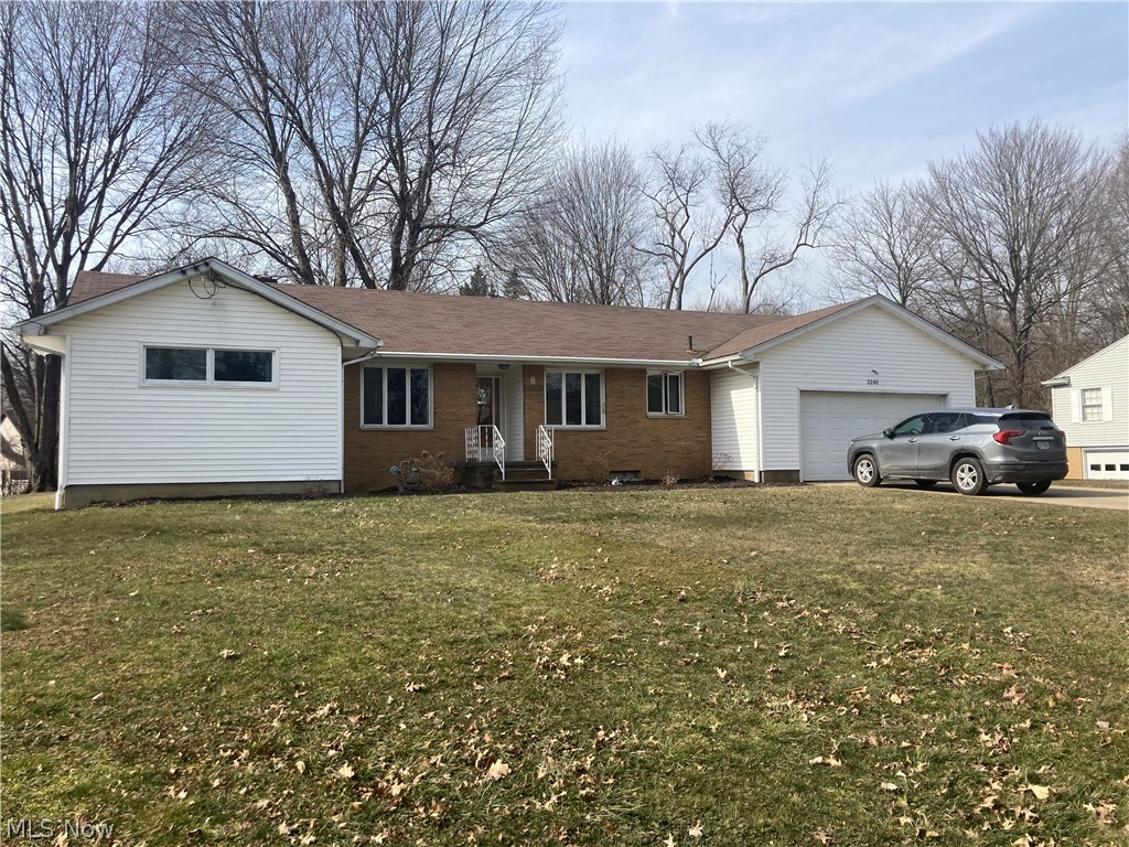 1577 Sq ft ranch with full useable basement Large enclosed patio overlooking large backyard. This home is move in ready on a very quiet street & extremely close to shopping. Newer stainless steal appliances that stay. Large kitchen & huge living area with fireplace. Home has a ton of windows providing lots of natural light throughout. 3 yr old ac - smart thermostat installed - 50 gal water tank 2 years old. Must see!