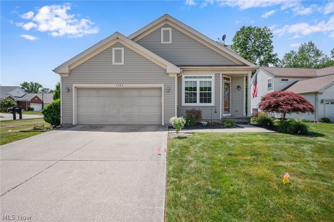 Enjoy low-maintenance living in this spacious & well-maintained Cape Cod located in Twinsburg's Whispering Woods community. This move-in ready home features 3 bedrooms, including a 1st-floor primary suite, 2.5 baths & over 2,100 sq ft of living space. 
A 2-story foyer opens to an airy & open floor plan highlighted by vaulted ceilings, abundant natural light & comfortable living spaces. The living room centers around a gas fireplace & flows into a dining area & beautifully updated eat-in kitchen featuring granite countertops, soft-close cabinetry, tile backsplash, stainless steel appliances & large center island w/ breakfast bar. Just beyond the main living area, a bright sunroom showcases a Palladian-style window & sliding door access to a private patio, creating the perfect space for relaxing or entertaining. A convenient 1st-floor laundry room & attached 2-car garage add everyday functionality. The 1st-floor primary suite offers a vaulted ceiling, walk-in closet & an updated en-suite bath with double vanity and a tiled Roman shower. A versatile 2nd-floor loft overlooking the main level provides flexible space for a home office, reading nook, or additional living area. A full basement offers excellent storage and endless possibilities for future finishing, , while a whole-house generator provides added peace of mind. RECENT UPDATES include: Replaced furnace/AC (2020), windows (2024), refrigerator (2021), stove, dishwasher & microwave (2024), washer/dryer (2018), water heater (2020), updated kitchen (2023), installed whole house generator (2023), gas fireplace (2015), replaced 1st-floor flooring (2018), carpet in master, stairs & 2nd floor (2021), and more! INCLUDED are ALL kitchen appliances, washer/dryer, generator, and bench in basement. The low monthly HOA fee includes landscaping and driveway snow removal. Point of sale inspection is complete and violation free. Conveniently located near I-480, OH-82, shopping, restaurants, parks, and other local attractions.