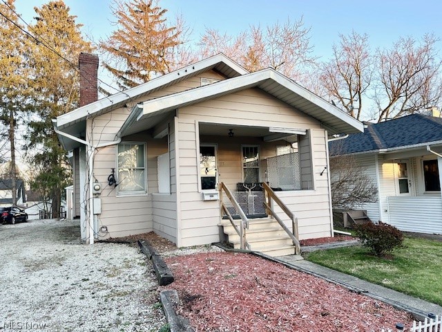Investor special! Darling 2 bedroom ranch home with beautiful woodwork! Living room with decorative fireplace opens to the den and spacious dining room boasting a stunning built in.  Updated fully applianced kitchen. Decent sized bedrooms with larger than expected closets and a roomy bathroom.  Basement has glass block windows.  Charming front porch and large 2 car garage! This home is tenant occupied at $810 per month, very long term tenant.   Tenant's lease doesn't end until 3/1/25. Property cannot go VA or FHA as it cannot be owner occupied until tenant lease is up. Minimum 24 hours advance notice for showings.