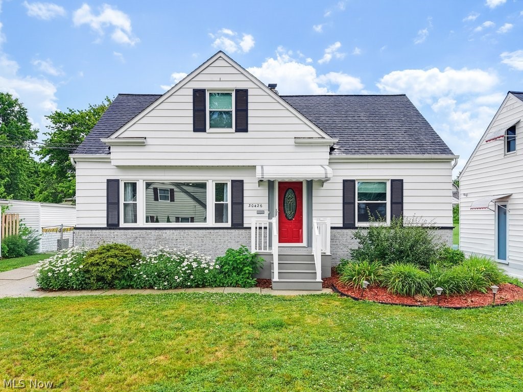 With its crisp white exterior, cheerful red front door, new front porch (2025), thoughtfully tended landscaping, and undeniable bungalow charm, this home is welcoming from the very first glance. Every inch reflects the kind of care that can't be staged, but only comes from years of prideful ownership. Inside, sunlight pours into the white kitchen, while updated finishes keep the home feeling fresh without sacrificing character. Two main level bedrooms share a renovated full bath, while the spacious second-floor suite offers a private retreat with a beautifully updated owner's bath (2026), sitting area, and incredible closet space. The finished lower level adds more than 500 square feet to spread out, giving everyone a place to claim as their own. Today it's a home theater and workout space. Tomorrow? That's entirely up to you! With new flooring, a recently added half bath, and generous storage, it's the kind of flexible space you've been craving. Outside, the backyard is ready for summer with a fully fenced yard, stamped concrete patio, and an above-ground pool that's perfect for cooling off after work, weekend barbecues, or keeping everyone entertained without leaving home. The location is just as appealing. Just a few streets from Manry Park, you'll have pickleball courts, bocce, permanent cornhole boards, playgrounds, picnic pavilions, sports fields, and a walking trail practically in your backyard—not to mention Royalview Elementary and Willowick Middle schools! It's the kind of neighborhood where evenings at the park become part of your routine and neighbors still wave as they pass by. All of this is just minutes from Lake Erie and centrally located to Downtown Willoughby, Mentor, Beachwood, and Downtown Cleveland. Affordable, updated, and full of personality in a fantastic location, this one is easy to fall in love with.