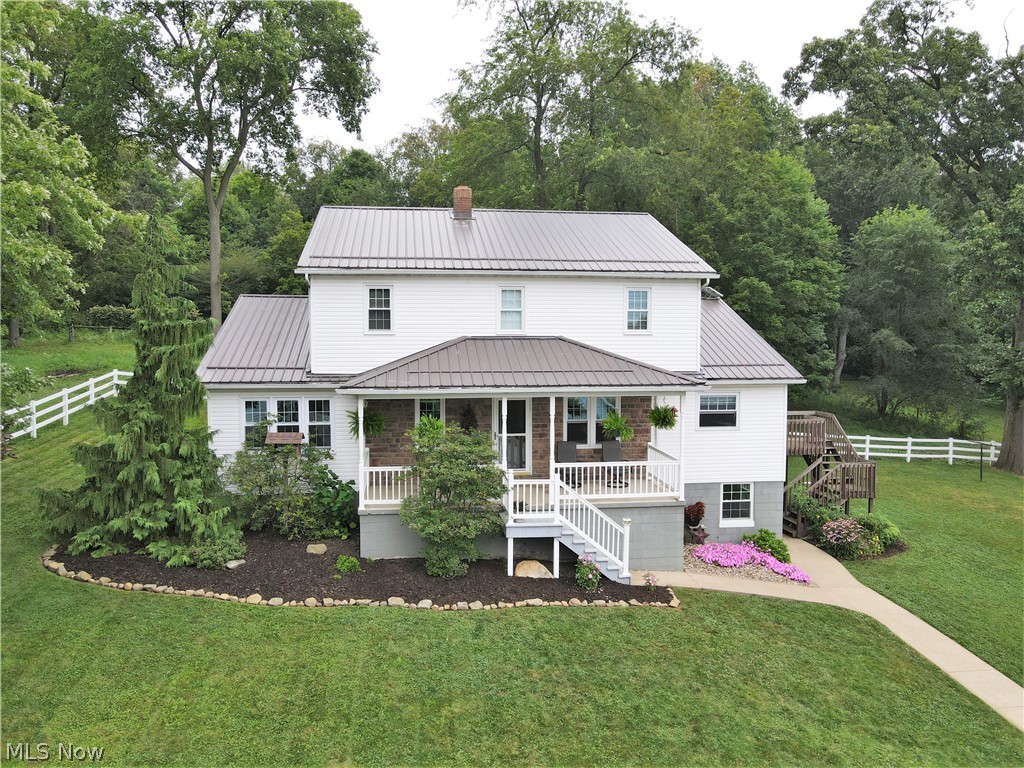A desirable property in a great setting and location, this property has lots to offer. Featuring a 2-story home that was built in 1996; and has 2700 sq. ft. of living space with 4 bedrooms and 2 baths. The main floor has a large kitchen/dining room area as well as a pantry & sewing room. The Master bedroom, and full bath complete the main floor. Upstairs you will find 3 bedrooms a full bath and a smaller room/office area. A full walkout basement, Nat gas or wood; hot water heat, gas lights throughout the home. Outside you will find a 60x36 shop built in 2006 that has in floor heat and is finished out with kitchen and living area and a full bath, giving you plenty of options. The Barn is 34x38 with 3 box stalls and fenced in pasture area. Be sure to check this one out a private setting with mature trees all around, you will like what you find here.